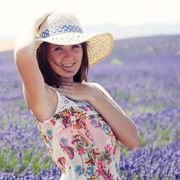 istock Young woman posing in lavender field 480535754