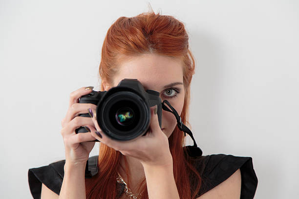 istock Young woman taking a photo 480536263