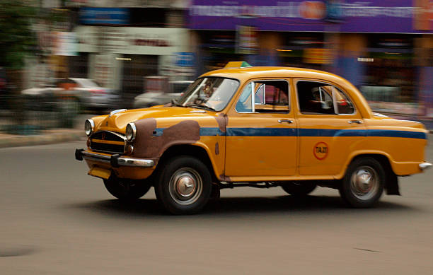istock old indian taxi in movement 480539195