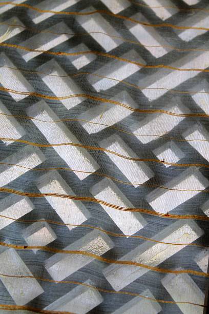 istock Wooden labyrinth grille seen through sheer curtain 480540712