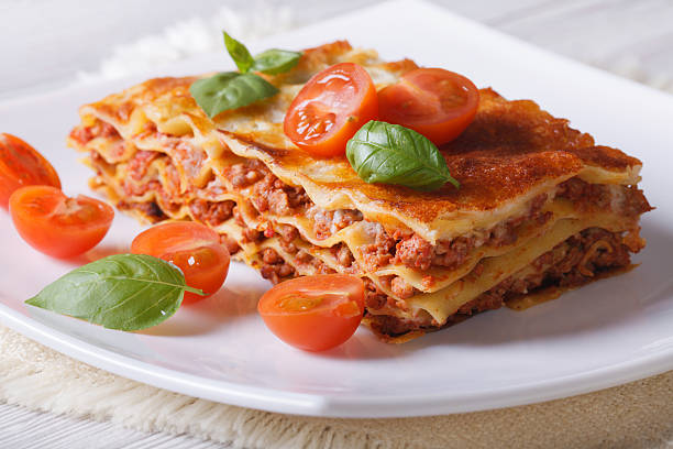 istock Italian Lasagna with fresh basil on a plate. horizontal 480541278