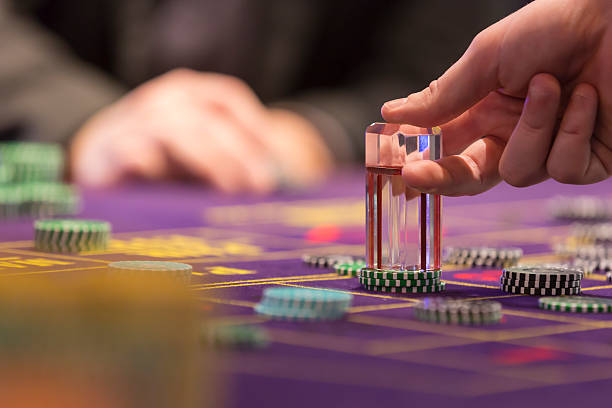 Casino chips on a roulette table stock photo