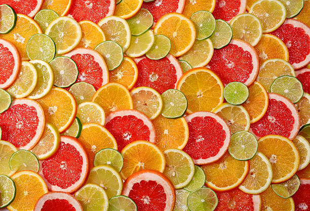 istock Sliced citrus fruits background. 480542886