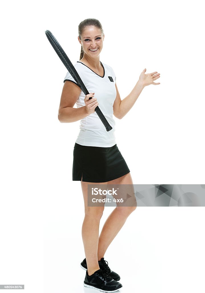 Tennis player walking with racket Tennis player walking with rackethttp://www.twodozendesign.info/i/1.png Happiness Stock Photo