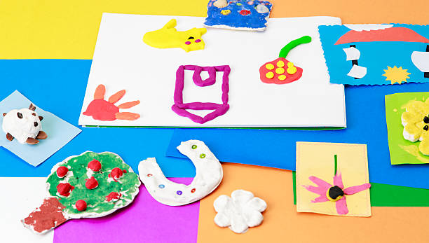 istock baby crafts from play dough and colourful paper 480544227