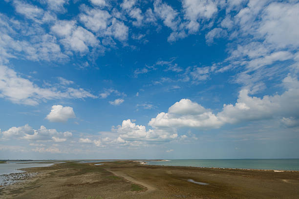 istock Sky and big clouds over firth with horizon line 480547448