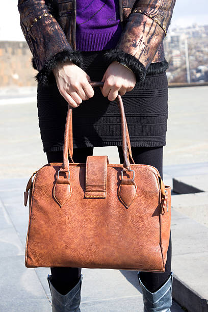 istock Girl holding a handbag 480547647