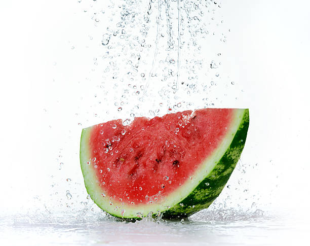 istock Red watermelon with splash of water 480552940