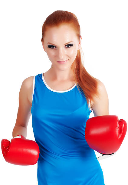 хорошенькая дев�очка с boxing gloves - isolated glamour conflict action стоковые фото и изображения