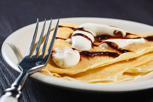 istock Closeup of chocolate pancakes with whipped cream 480553807