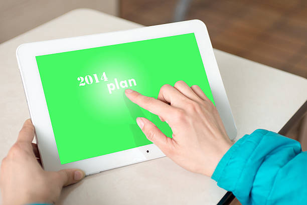 plan Use your tablet to do 2014 work plan 2014 stock pictures, royalty-free photos & images
