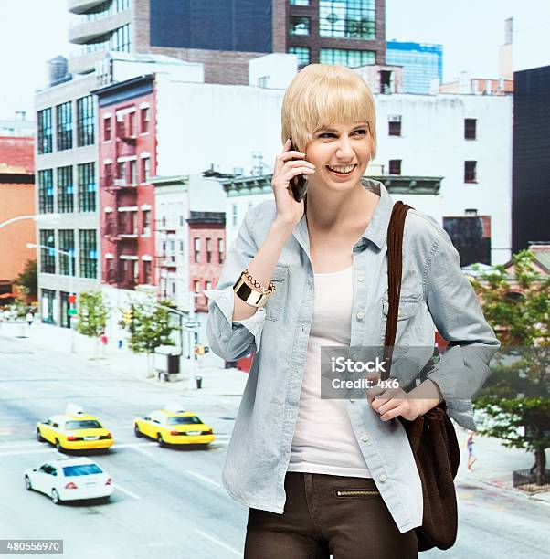 Beautiful Woman Talking On Mobile Phone Stock Photo - Download Image Now - Road, 20-24 Years, 20-29 Years