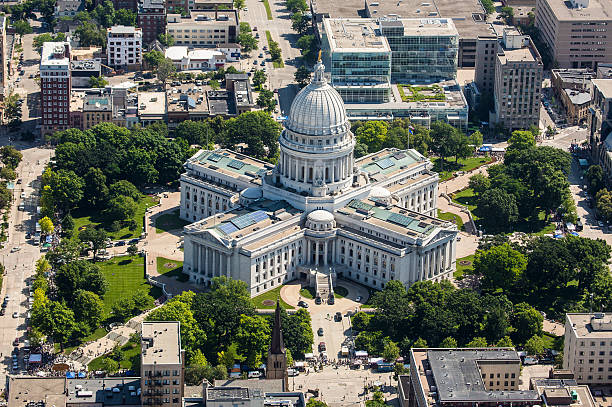 Wisconsin State Capitol from air State Capitol of Wisconsin from the air. Shot from an airplane on a Saturday during the Dane County Farmer's Market. Very sharp and contrasty image.  wisconsin state capitol photos stock pictures, royalty-free photos & images