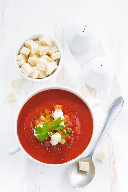 istock gazpacho with croutons and vegetables in a bowl, vertical 480557440