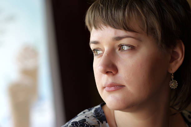 istock Portrait of thoughtful  woman 480558284