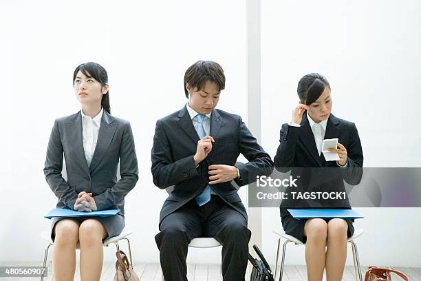 Men And Women Waiting Their Turn For Interview Stock Photo - Download Image Now - Job Interview, Interview - Event, Job Search