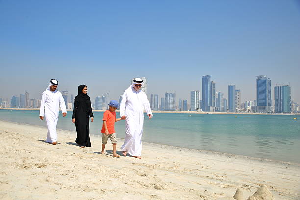 istock Arabian family walking in parbeach 480561774