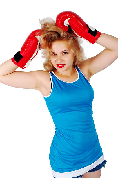 хорошенькая девочка с boxing gloves - isolated glamour conflict action стоковые фото и изображения