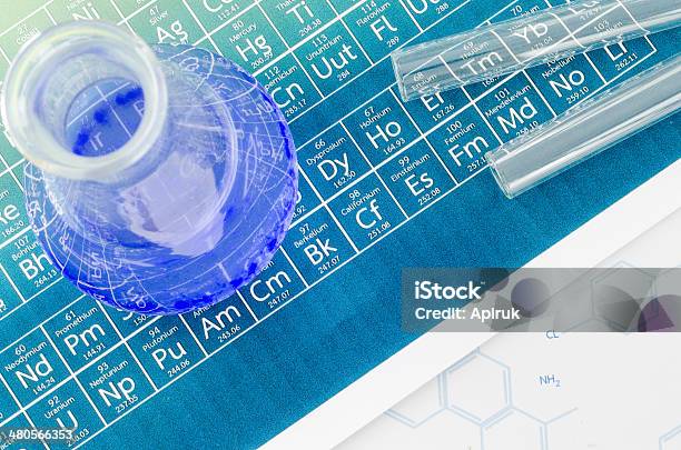 Laboratory Glassware And Periodic Table Of Elements Stock Photo - Download Image Now