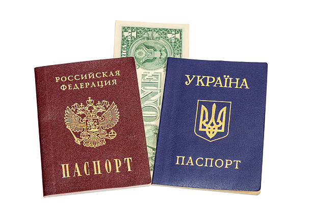 istock Ukrainian and Russian  passports isolated on white background 480567969