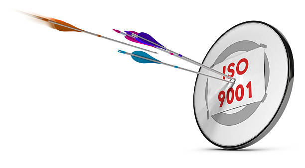 ISO 9001 One target with three colorfull arrows hitting the text ISO 9001. Concept image for illustration of quality standard. 2015 stock pictures, royalty-free photos & images