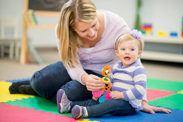 istock Mother and Daughter at Daycare 480576580