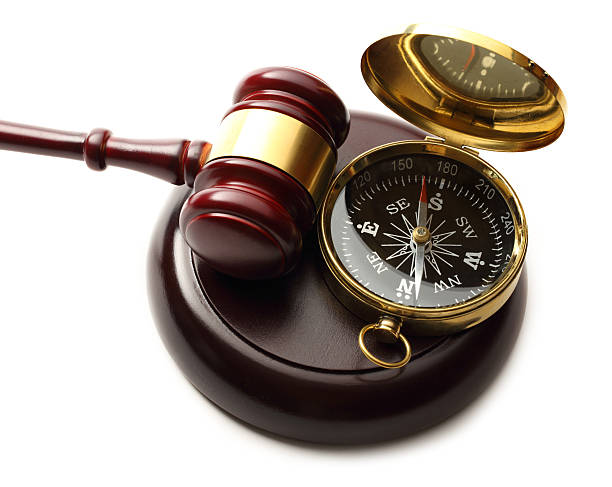 istock Judge's wooden gavel and compass 480577497