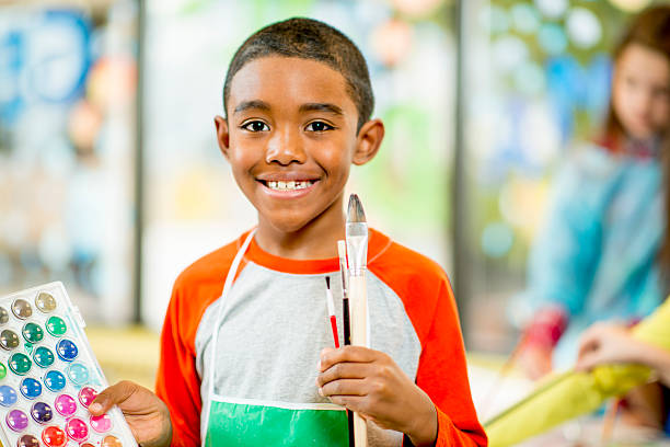 istock Little Boy Painting 480579022