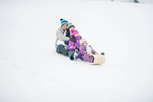 istock Family Tobogganing 480579074