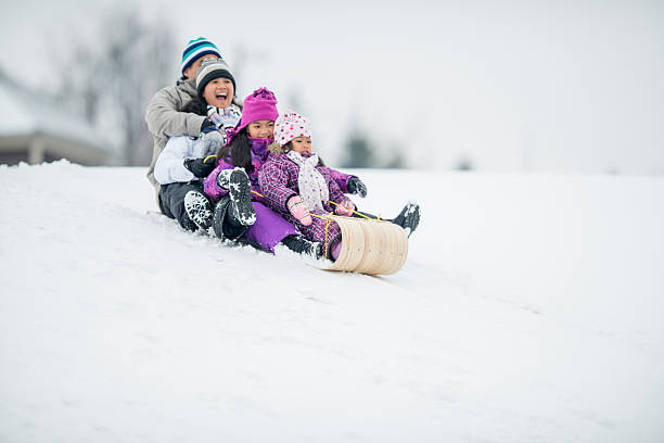 istock Family Tobogganing 480579076