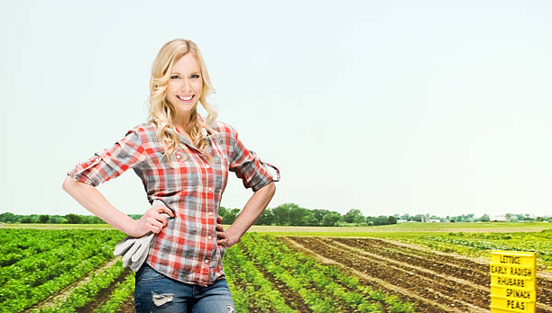 istock Woman standing in field 480581626