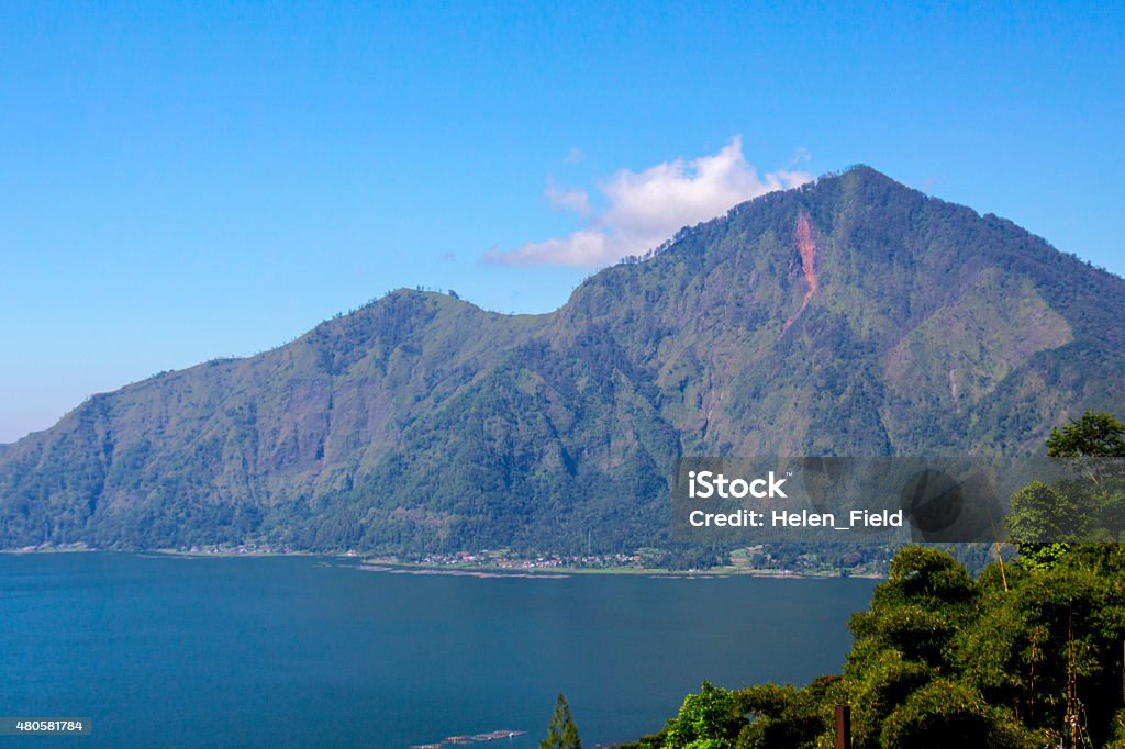 Batur volcano in the sunshine day Panoramic view of Batur volcano in the sunshine day  2015 Stock Photo