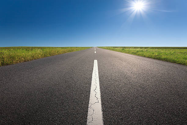 istock Driving on an empty asphalt road at idyllic sunny day 480582156