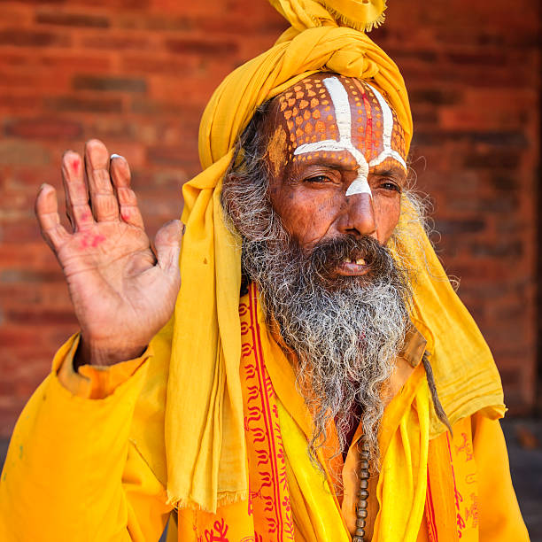 istock Sadhu - indian holyman sitting in the temple 480585393