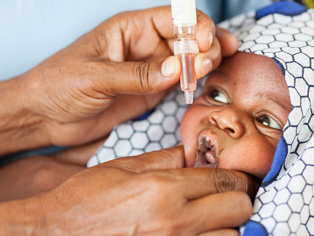 African Baby Receiving Vaccine stock photo