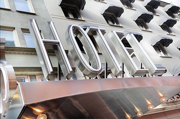 istock Hotel sign over building entrance 480593445