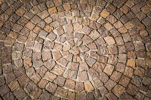 pórfido carretera circular textura - stone textured italian culture textured effect fotografías e imágenes de stock