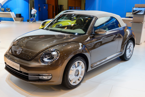 Brussels, Belgium - January 14, 2014: Brown Volkswagen New Beetle Cabriolet on display at the 2014 Brussels motor show.