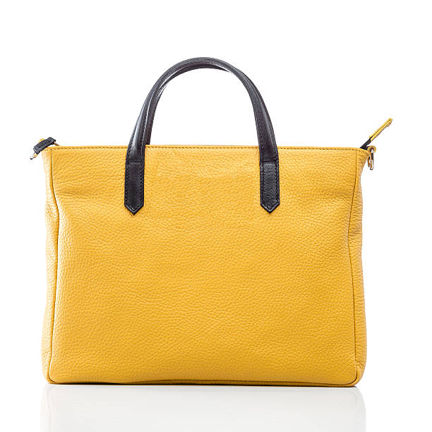 istock female yellow leather handbag 480597775