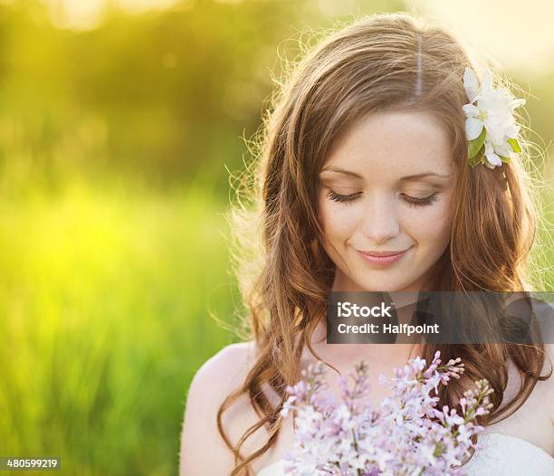 Beautiful Spring Girl With Flowers On The Meadow Stock Photo - Download Image Now - Formal Garden, Women, Adult