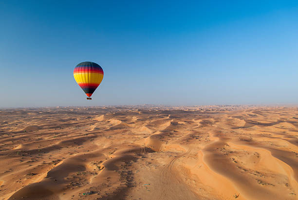 istock Colorful hot air balloon over Desert in sunlight 480600901