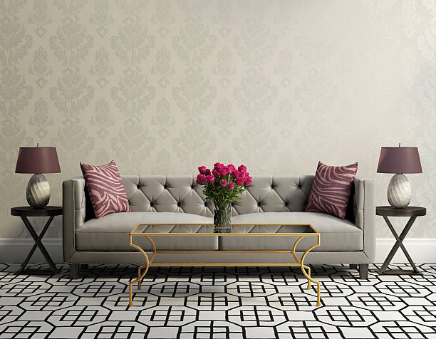 Vintage classic elegant living room with grey velvet sofa Vintage classic elegant living room with grey velvet sofa, side tables and a vase with pink flowers golden roses stock pictures, royalty-free photos & images