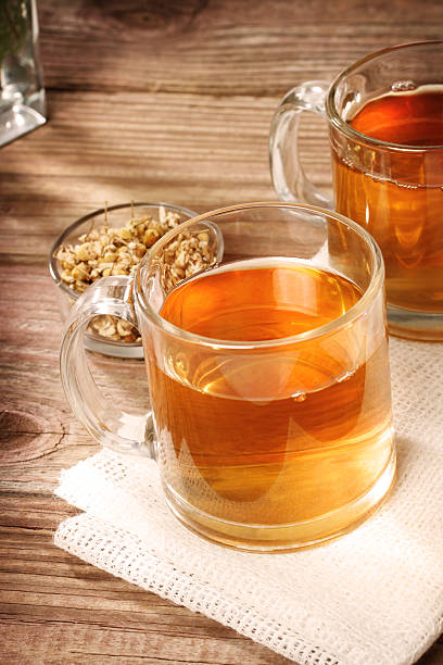 istock Chamomile tea with dried flowers 480601755