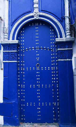 Colorful door. Chefchaouen, or Chaouen, is a city in the Rif Mountains of northwest Morocco.  It’s known for the striking, blue-washed buildings of its old town.