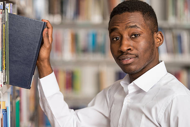istock Portrait Of A Student In A Library 480606542