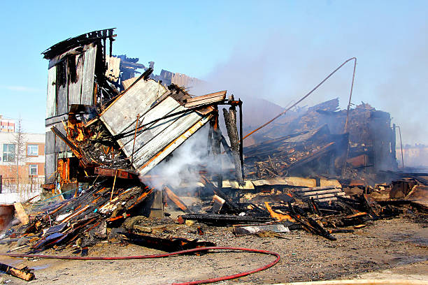 istock Old wooden residential house after a fire 480607344