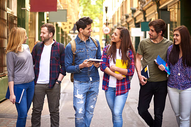 istock Group of friends talking about school 480609674