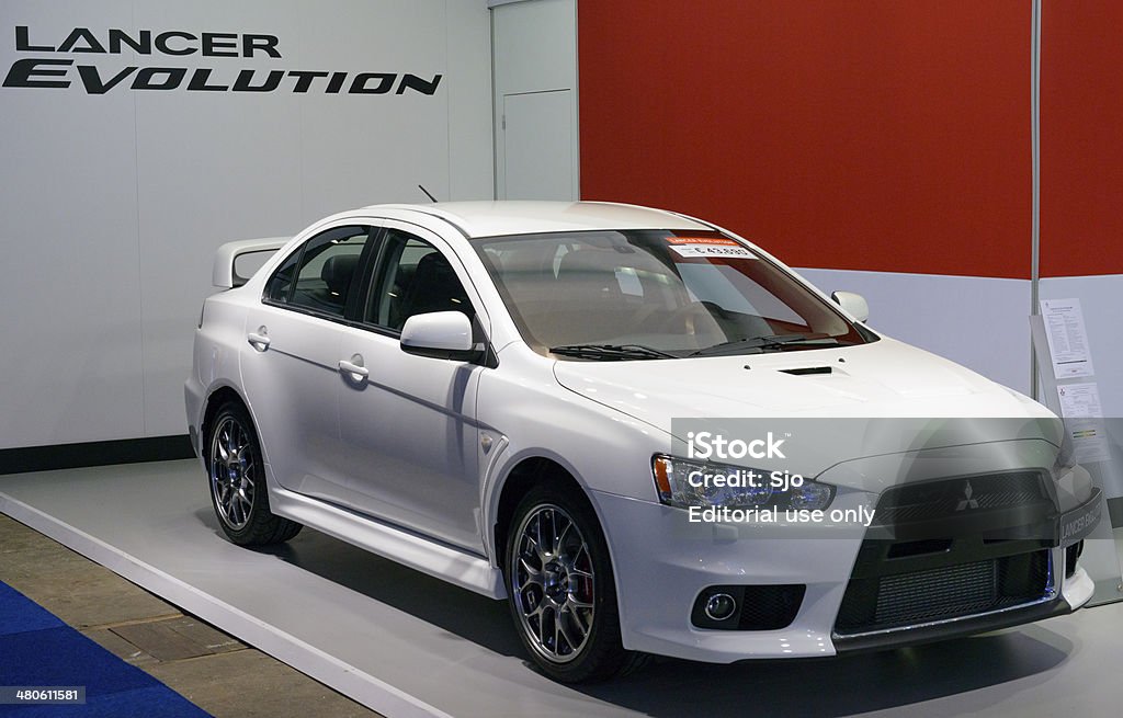 Mitsubishi Lancer Evolution Brussels, Belgium - January 14, 2014: Mitsubishi Lancer Evolution X performance sedan on display at the 2014 Brussels motor show. Development Stock Photo