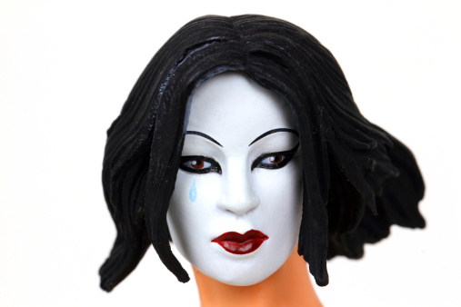 Vancouver, Canada - January 27, 2014: A model of the comic book character Kabuki against a white background. Kabuki is a young assasin who operates in the shadowy realm of the Japanese underworld. The comic is written and drawn by David Mack. The model is distributed by Diamond Select Toys.