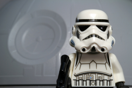 Vancouver, Canada - July 25, 2012: A toy Lego stormtrooper  from the Star Wars film franchise, posed against the Death Star